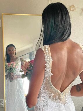 Elegant Ivory Lace Wedding Dress with Beaded Open Back
